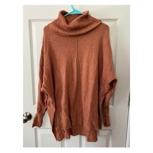 2 Tunic sweaters in rust and white